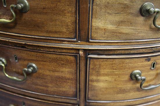 A George III mahogany oval pedestal partners desk, W.4ft 11in. D.3ft 1in. H.2ft 7in.